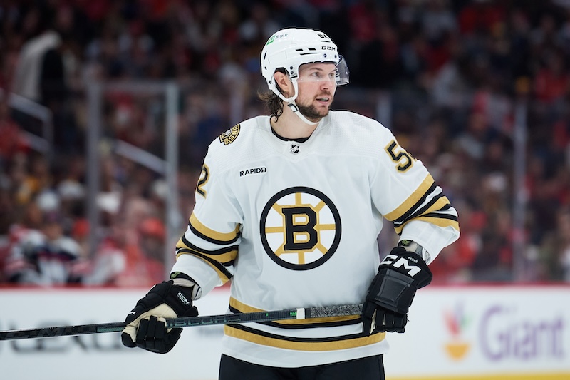 Boston Bruins defenseman Andrew Peeke (52) prepares for a face-off against the Washington Capitals during the second period at Capital One Arena.