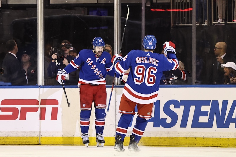 New York Rangers left wing Chris Kreider (20) is greeted by New York Rangers center Jack Roslovic (96) after scoring a goal in the third period against the Washington Capitals in game one of the first round of the 2024 Stanley Cup Playoffs at Madison Square Garden.