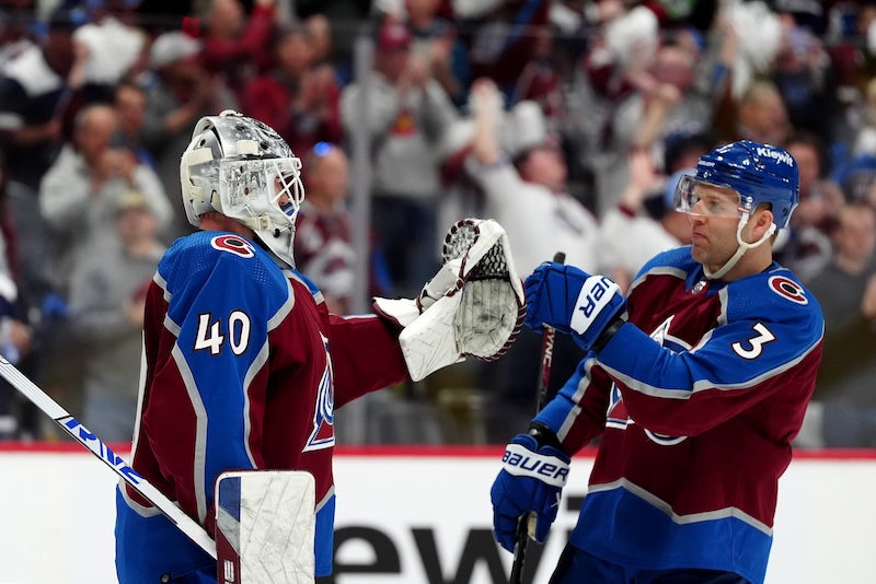 Colorado Avalanche goaltender Alexandar Georgiev (40) and Colorado Avalanche defenseman Jack Johnson (3) celebrate defeating the Winnipeg Jets following game four of the first round of the 2024 Stanley Cup Playoffs at Ball Arena.