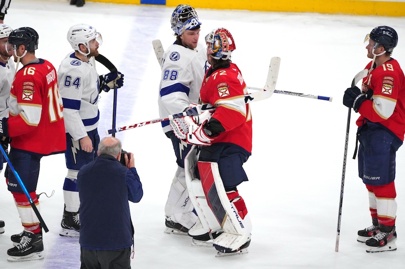 Tampa Bay Lightning goaltender Andrei Vasilevskiy (88) congratulates Florida Panthers goaltender Sergei Bobrovsky (72) following game five of the first round of the 2024 Stanley Cup Playoffs at Amerant Bank Arena. The Panthers advance to the second round.