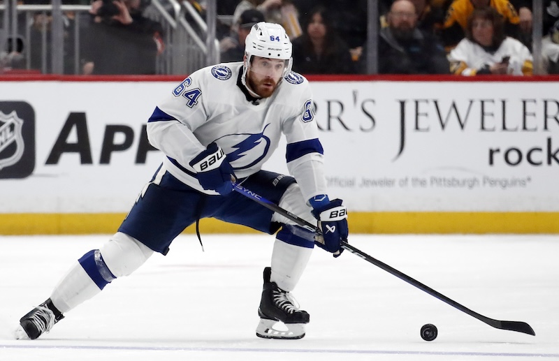 Tampa Bay Lightning center Tyler Motte (64) skates with the puck against the Pittsburgh Penguins during the second period at PPG Paints Arena.