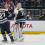 Nov 23, 2024; Columbus, Ohio, USA; Columbus Blue Jackets goaltender Elvis Merzlikins (90) and center Sean Monahan (23) celebrate after defeating the Carolina Hurricanes in a shootout at Nationwide Arena.