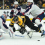 Columbus Blue Jackets defenseman Zach Werenski (8) is called for a penalty on Boston Bruins left wing Brad Marchand (63) during the third period at TD Garden.