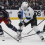 Columbus Blue Jackets defenseman Zach Werenski (8) steals the puck from Utah Hockey Club center Clayton Keller (9) during the first period at Nationwide Arena.