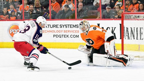 Cam Atkinson scores a Blue Jackets goal on a breakaway against Flyers goalie Steve Mason.