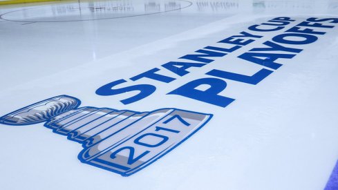 Stanley Cup Playoffs logo on the Nationwide Arena ice.