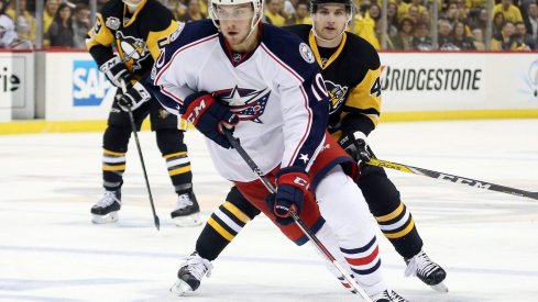 Alexander Wennberg skating away from the Penguins in the 2017 Stanley Cup Playoffs