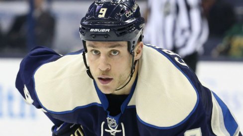 Gregory Campbell waits for the puck to be dropped during a game