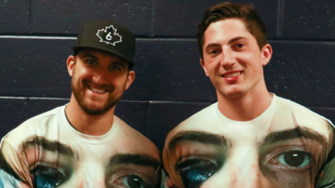 Zach Werenski and Nick Foligno pose for a picture in Werenski's now infamous t-shirt