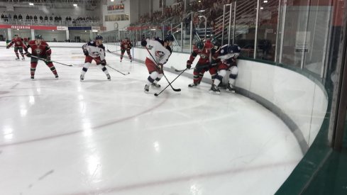 The Columbus Blue Jackets wait for the puck to drop during their second game in Traverse City against the Minnesota Wild