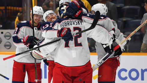 Sergei Bobrovsky celebrates with multiple players after a convincing win against the Nashville Predators during the preseason