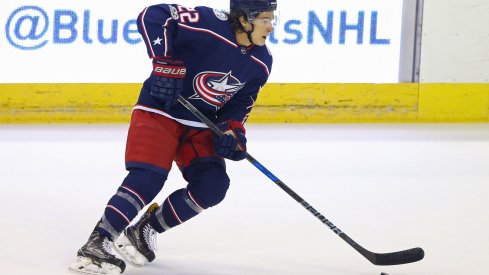 Sonny Milano skates up the ice with the puck during the preseason