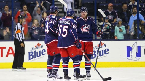 Markus Nutivaara and Josh Anderson celebrate a goal with former Blue Jacket Scott Hartnell.