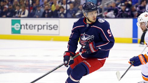 Artemi Panarin carries the puck for the Blue Jackets against the Islanders on opening night.