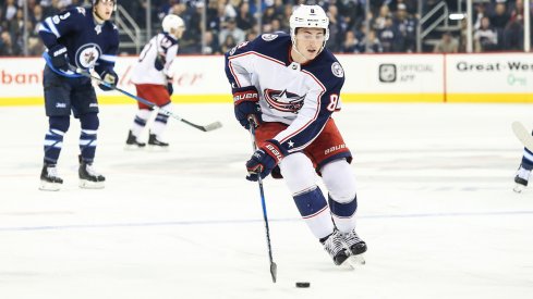 Zach Werenski carries the puck against the Winnipeg Jets during the fourth-straight win for the Columbus Blue Jackets