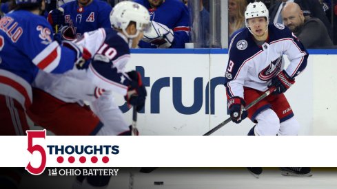 Artemi Panarin looks for a player to pass to during their game against the New York Rangers