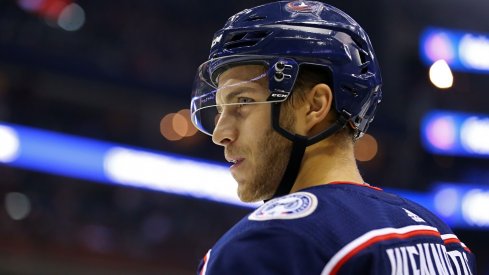 Alexander Wennberg stands around during pre-game warmups