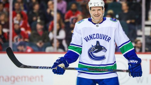 Derek Dorsett waits for the puck to drop during a game against the Calgary Flames