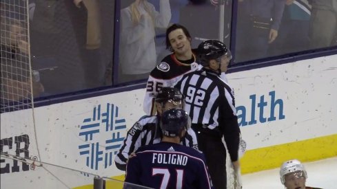 Ducks goaltender John Gibson gets into it with Blue Jackets forward Nick Foligno