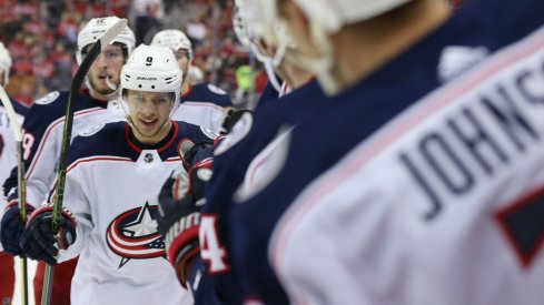 Artemi Panarin celebrates with teammates