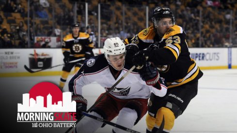 Markus Nutivaara fights for the puck against the Boston Bruins