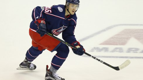 Dean Kukan skates up the ice waiting to receive the puck