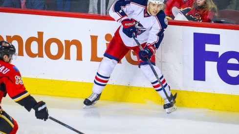 Jack Johnson passes the puck against the Calgary Flames