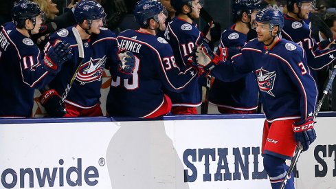 Seth Jones celebrates a goal against the Vancouver Canucks