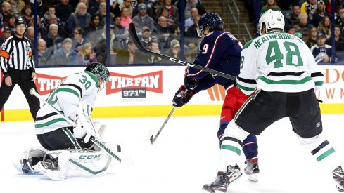 Artemi Panarin tries to put the puck past Stars goaltender Ben Bishop