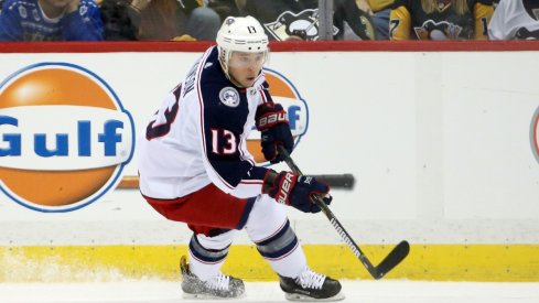 Cam Atkinson tries to enter the zone against the Pittsburgh Penguins