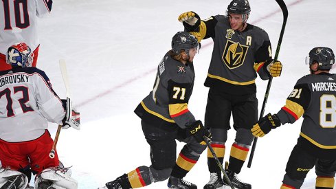 William Karlsson, Reilly Smith and Jonathan Marchessault celebrate a win over the Blue Jackets 