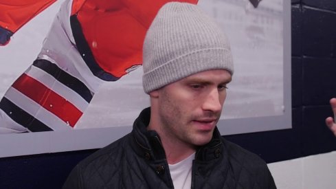 Boone Jenner talks to the media after practice on January 31