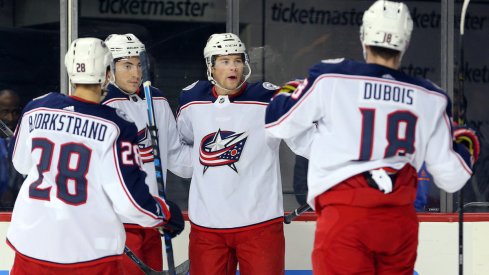 Blue Jackets celebrate a goal against the New York Islanders