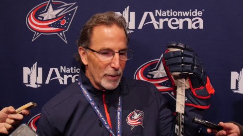 John Tortorella speaks to the media after practice on February 5