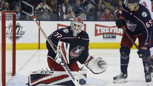 Sergei Bobrovsky pushes a puck towards the boards against the Washington Capitals