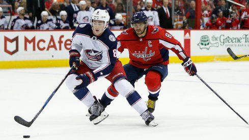 Zach Werenski carries the puck against the Washington Capitals 