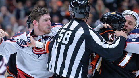 Pierre-Luc Dubois scraps with Ryan Kesler in the Columbus Blue Jackets' loss to the Anaheim Ducks 