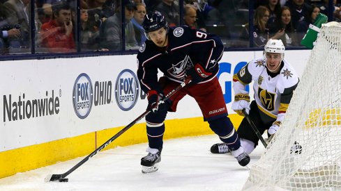 Artemi Panarin carries the puck against the Vegas Golden Knights