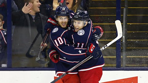 Matt Calvert and Alexander Wennberg celebrate a shorthanded goal against the Detroit Red Wings. 