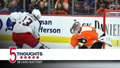 Cam Atkinson tries to put the puck past the Flyers' Petr Mrazek