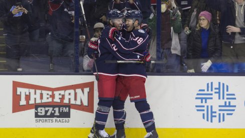 Boone Jenner and Thomas Vanek celebrate a Blue Jackets goal against the Ottawa Senators