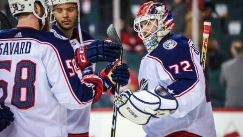 Sergei Bobrovsky and the Blue Jackets celebrate a road win.