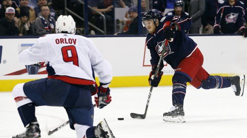 Cam Atkinson shoots against the Washington Capitals