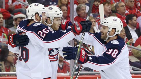 Boone Jenner and Alexander Wennberg celebrate a second period goal against the Capitals.