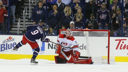 Columbus Blue Jackets forward Artemi Panarin scores a shootout goal against Hurricanes goaltender Scott Darling at Nationwide Arena.