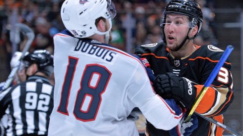 Pierre-Luc Dubois gets into it with Ducks forward Nick Ritchie