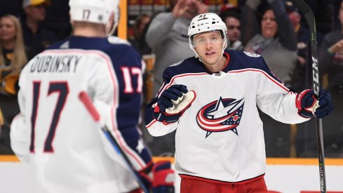 Markus Hannikainen celebrates a goal with Brandon Dubinsky late in the 2017-18 season.