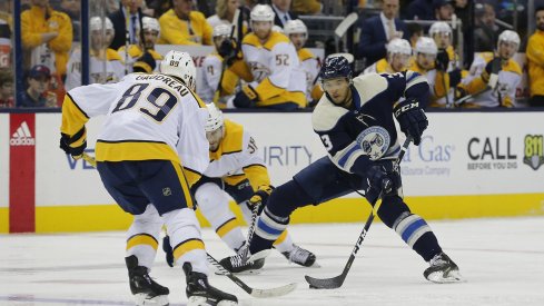 Seth Jones looks to make a move in a 4-3 overtime victory for the Columbus Blue Jackets against the Nashville Predators.