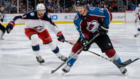 Columbus Blue Jackets defenseman Seth Jones defends against Blake Comeau of the Colorado Avalanche at Pepsi Center in Denver.