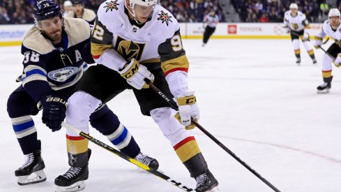 Boone Jenner battles with Golden Knights player Tomas Nosek 